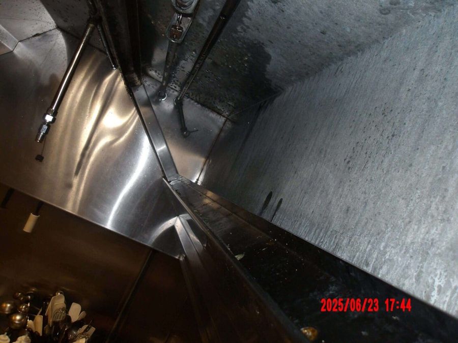 The same grease trough cleaned to bare metal