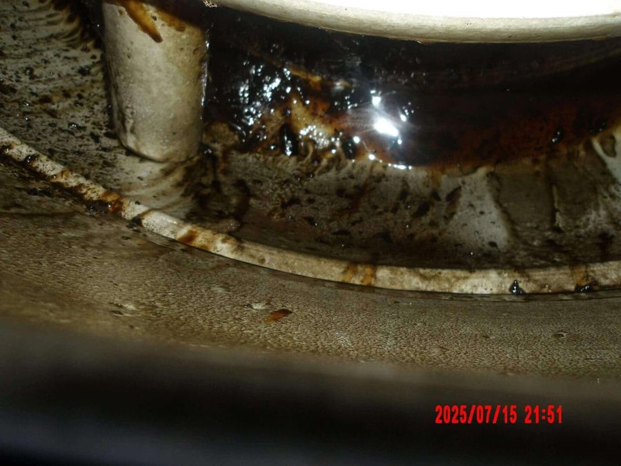 Grease-caked fan bowl before cleaning by Oregon Hood Cleaning